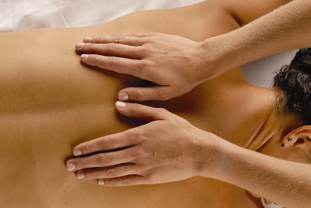 How does deep tissue massage differ from a normal massage?
